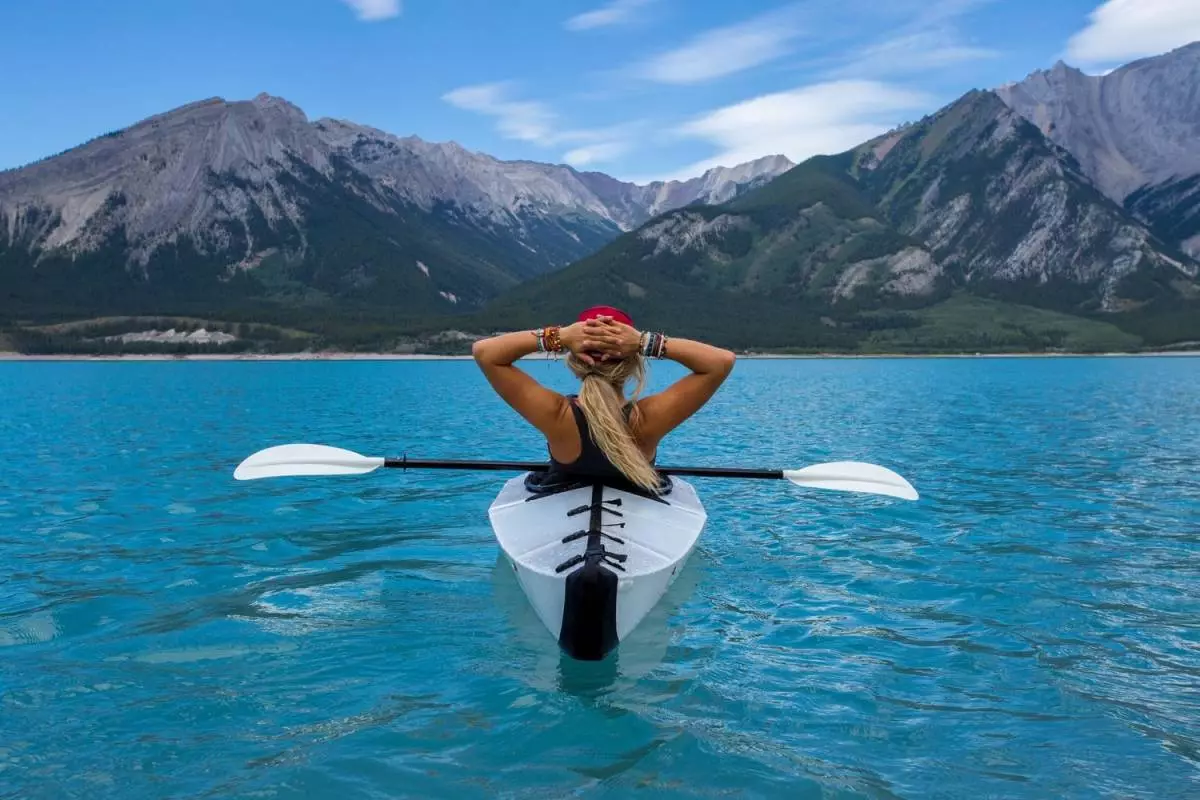 A Woman Kayaking on Lake Annecy